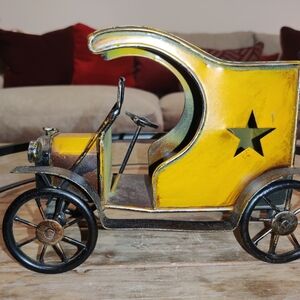 Vintage Replica Open Metal Car. Cut Out Star Designs and Curved Roof.